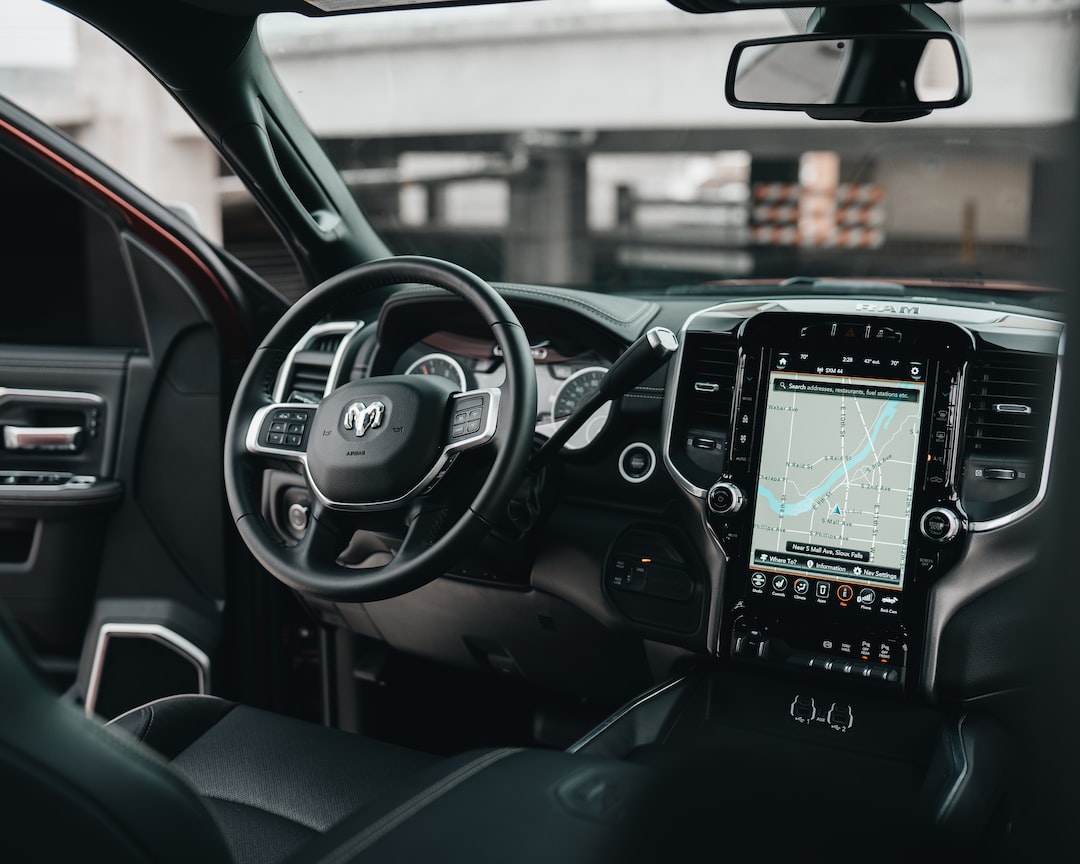 The interior of a ram truck with a gps system.