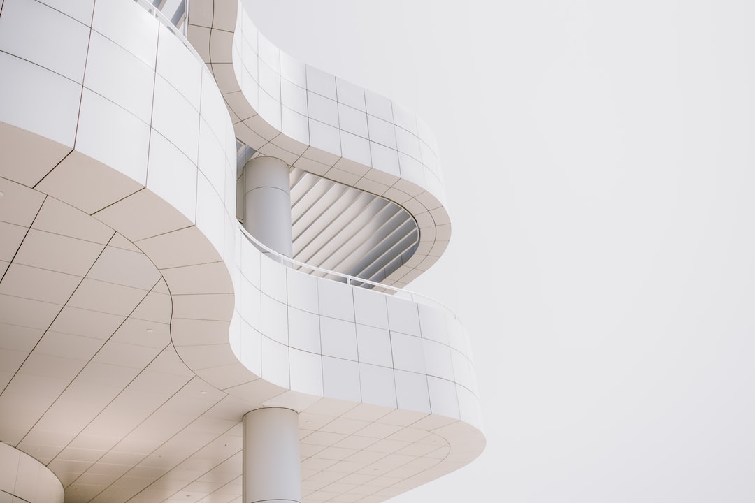 3d rendering of a white building with curved walls.