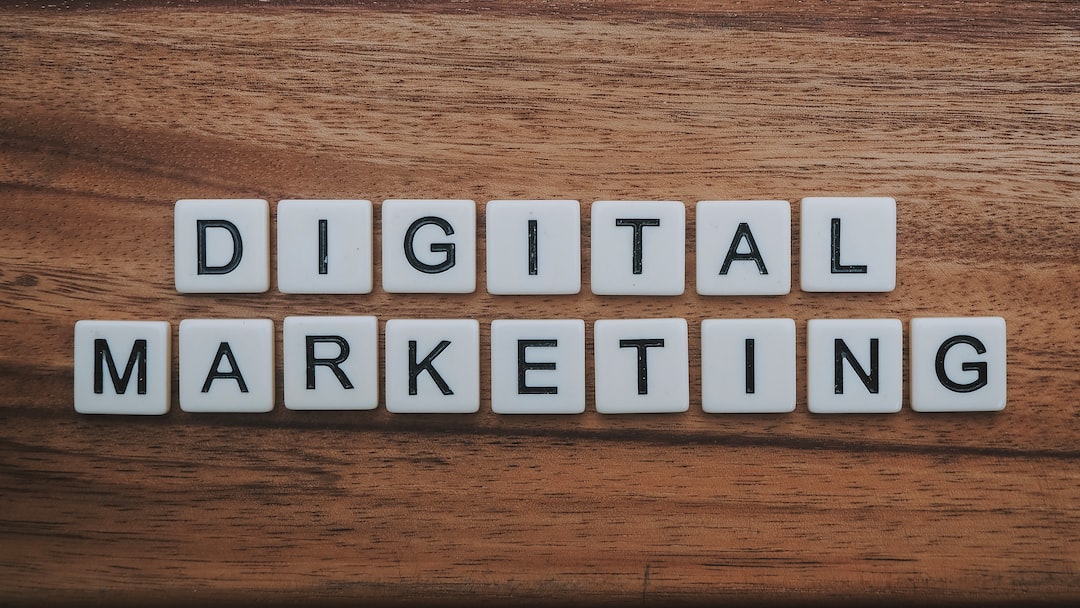 The word digital marketing spelled out on a wooden table.