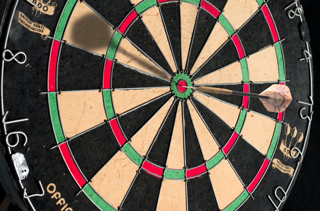 An image of a dart board with a dart in it.