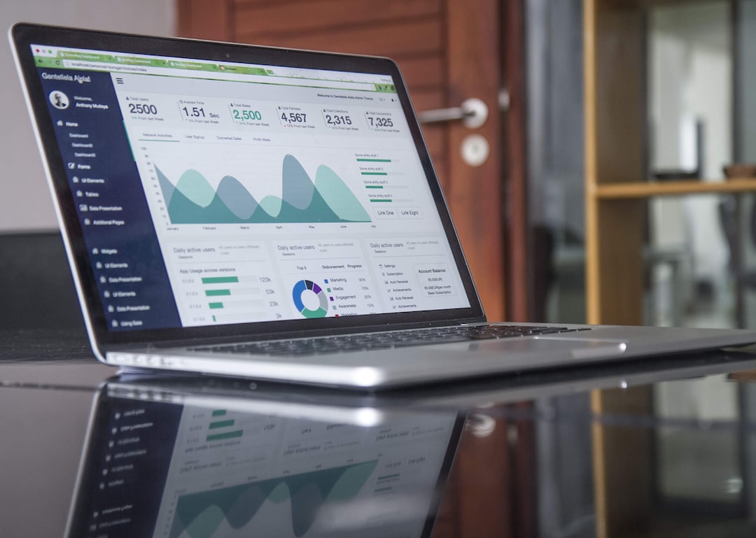 A laptop with a dashboard on it sitting on a table.